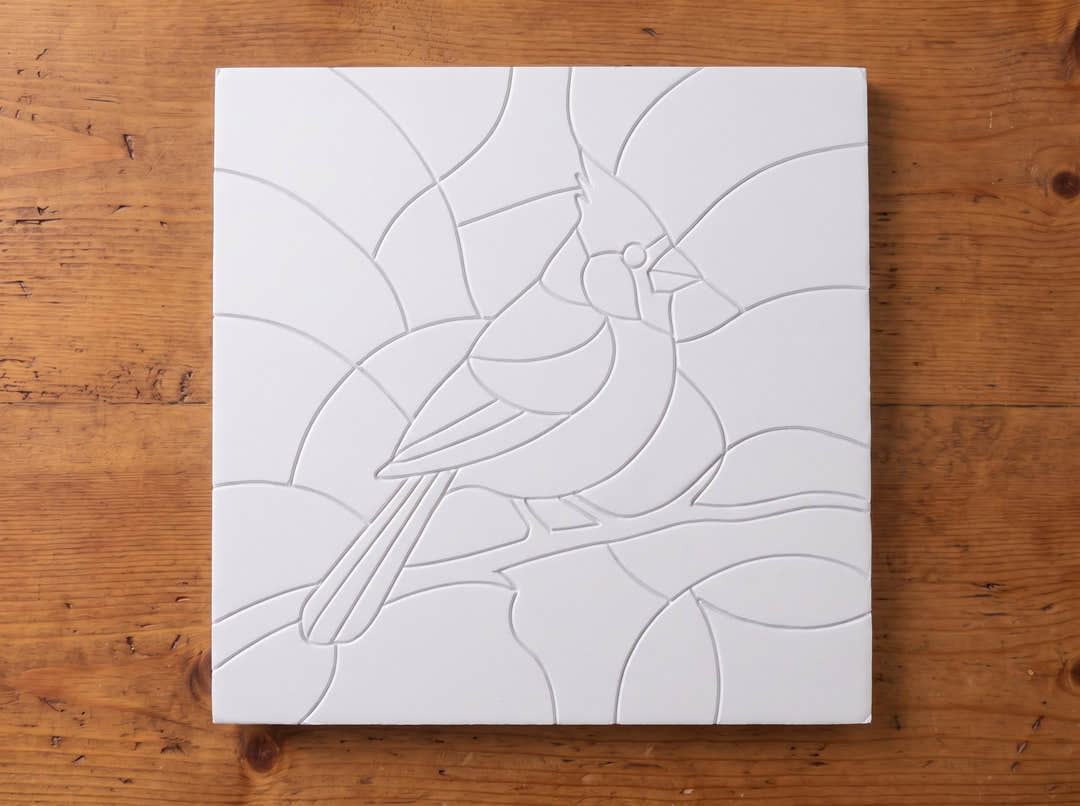 Blank cardinal design board before fabric